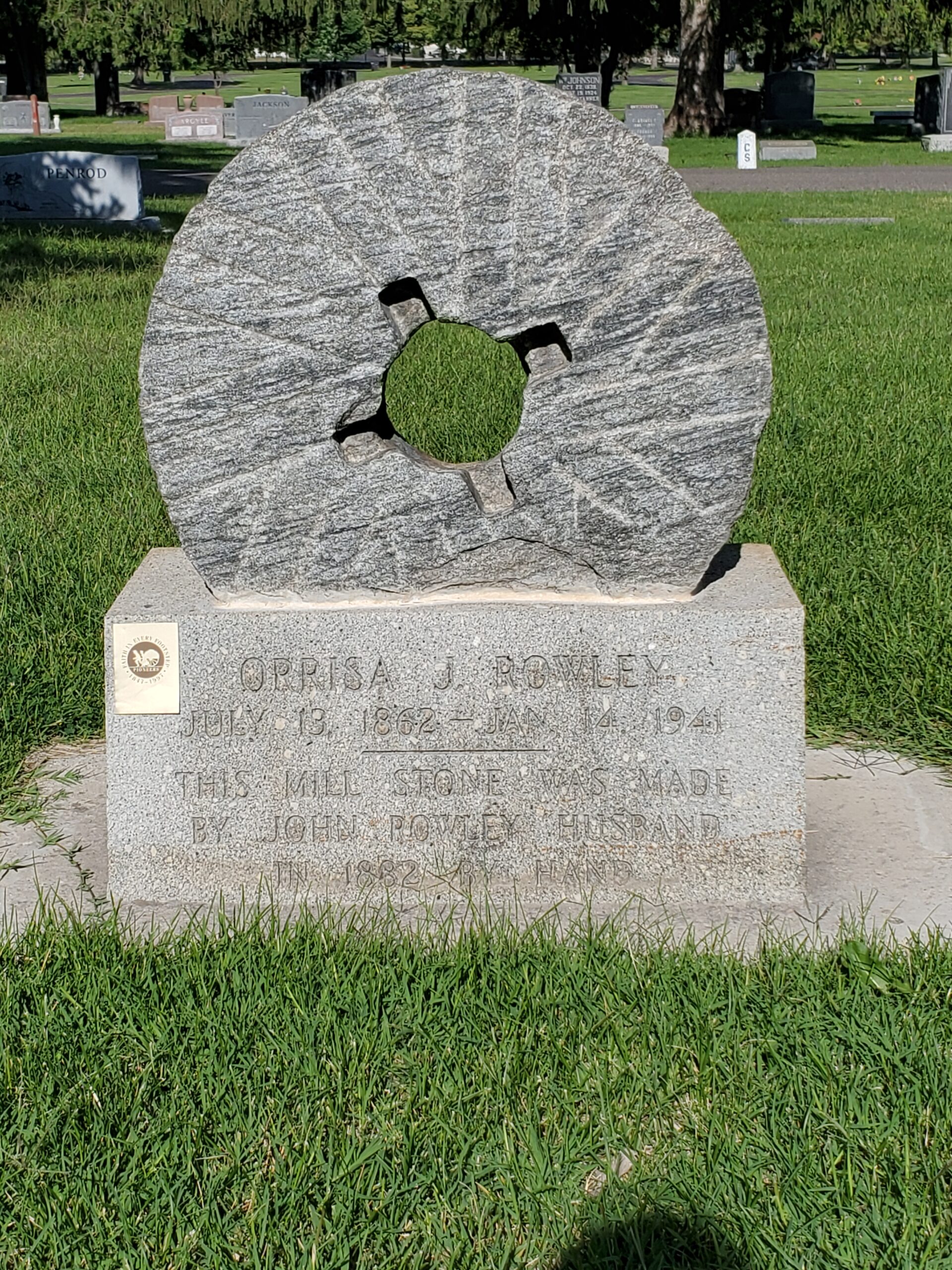 This grave is marked with a millstone made by the deceased's husband in the 1800's