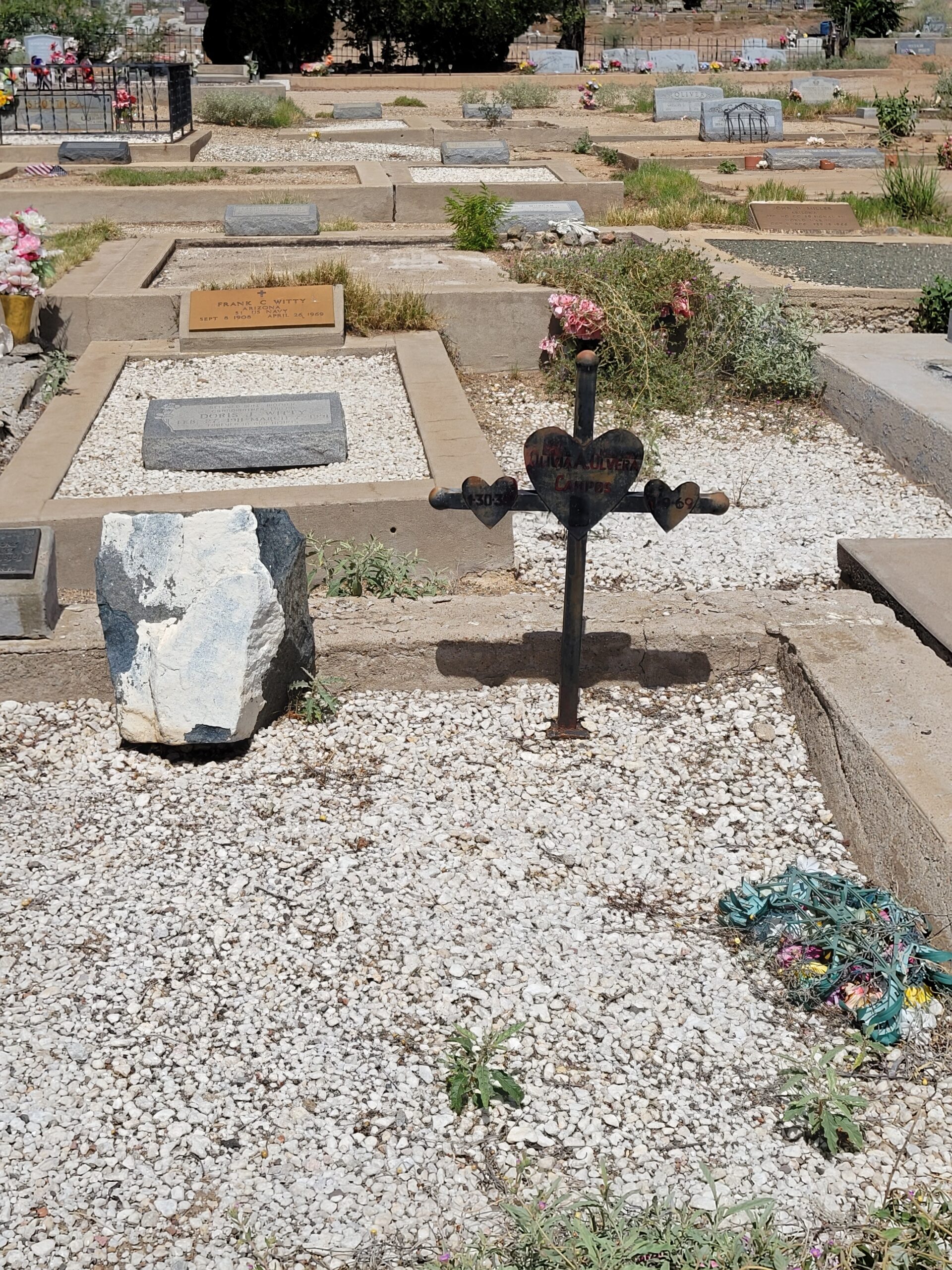 Grave with metal cross marker