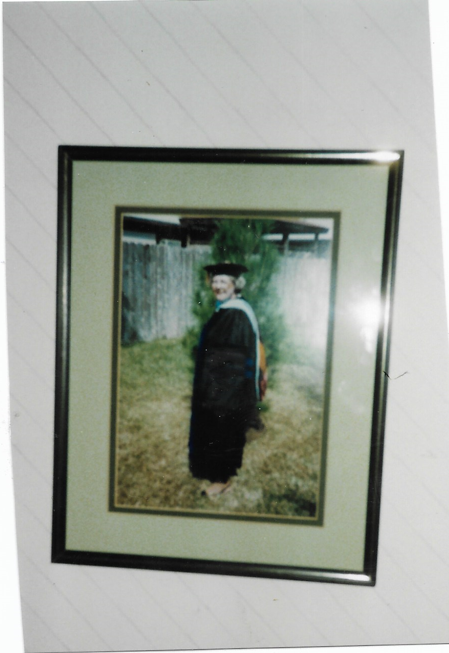 Framed fuzzy photo of Helen in cap and gown